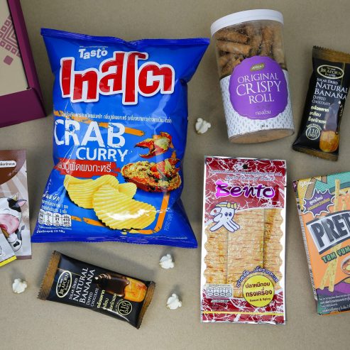 HEAP subscription Thai snack box curates a variety of famous Thai snacks including crab curry chips, spicy snacks and dried banana