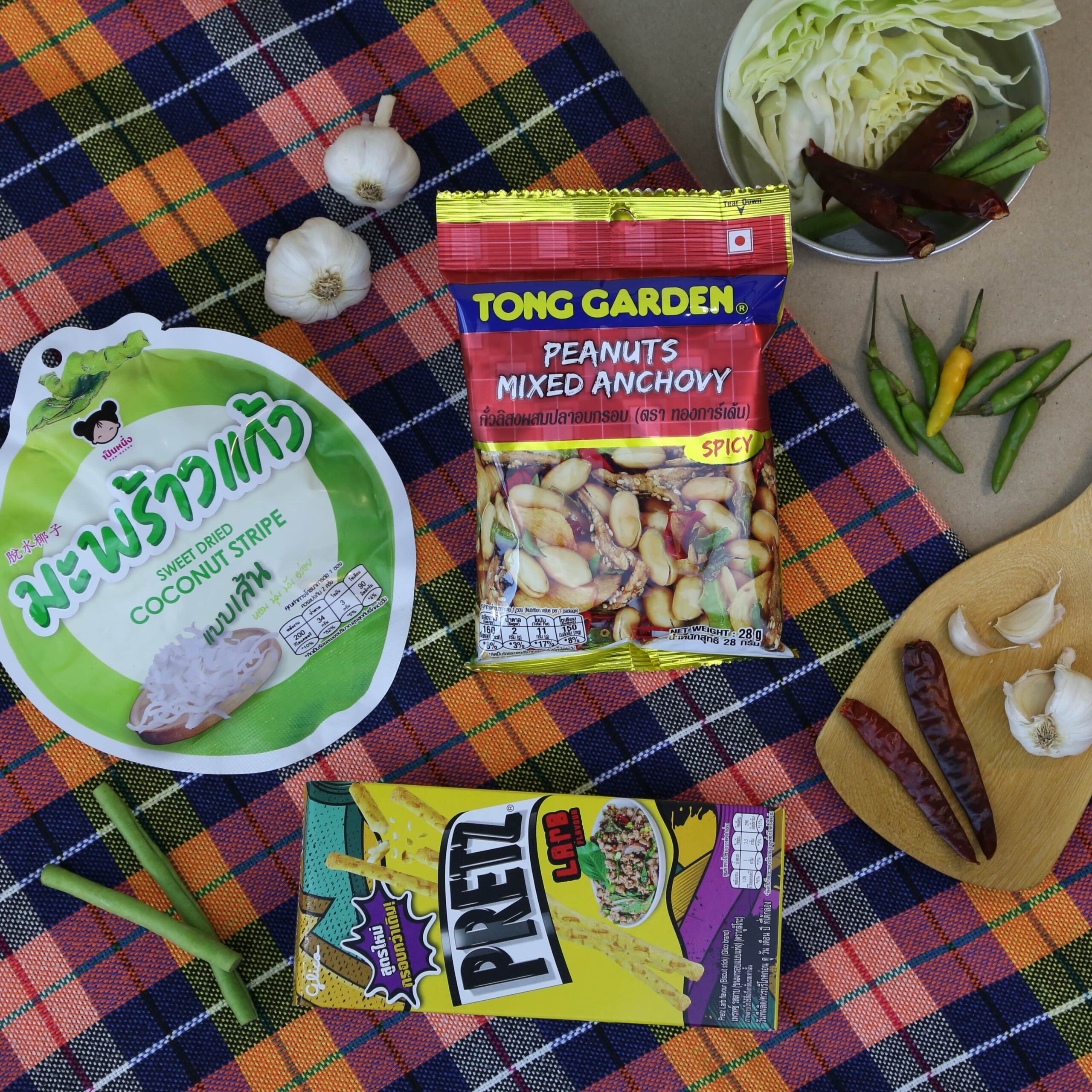Assorted Thai snack under the theme Phi Ta Khon Festival of Heap Brand's snack box