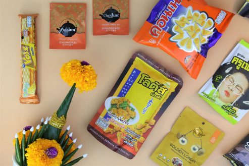 Thai snacks with yellow packaging under Loy Krathong festival theme