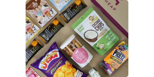 HEAP Thai snack subscription box includes over 10 items of sweet and savory snacks such as dried banana, coconut chips and coconut rolls