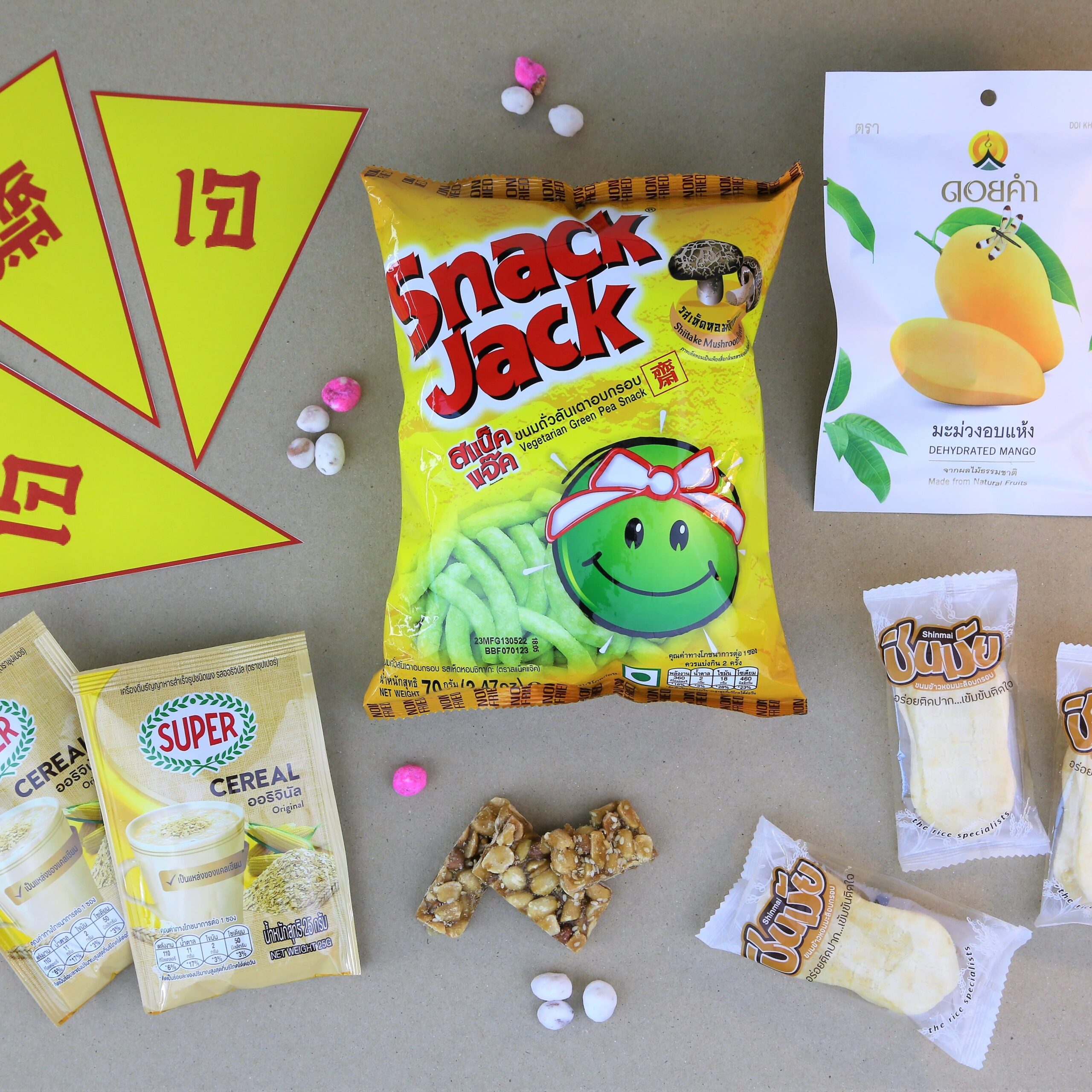 Vegan snack box consists of vegan Thai snacks such as dried mango and rice crackers