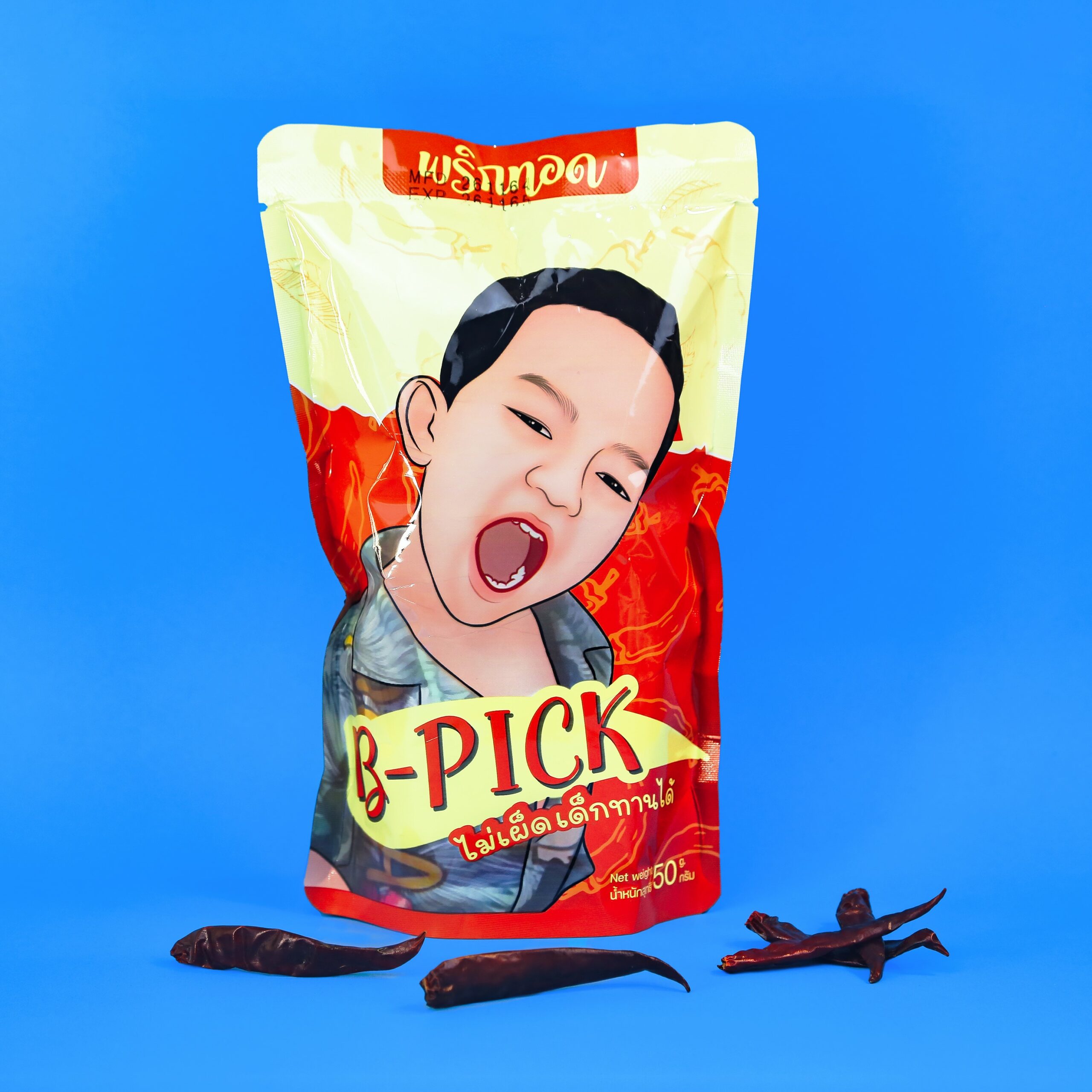 Prik Tod Fried chili with sesame snack. Local Thai snack brand with a face of a kid on the packaging.