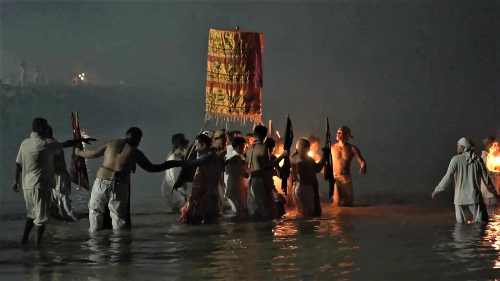 procession into the sea in Phuket Thailand during Jay festival