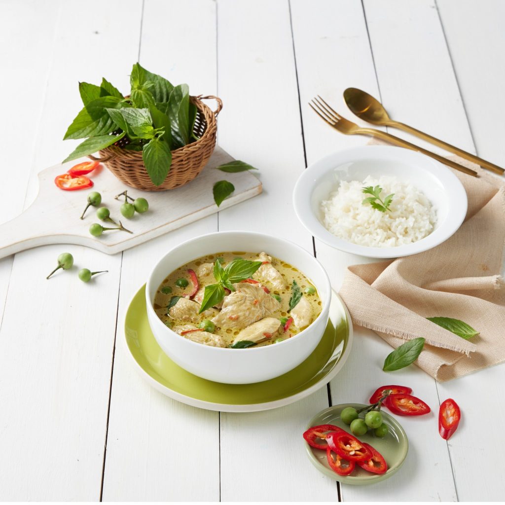 Thai green curry contains basil leaves, green chili and curry paste. Common Thai food eaten with rice